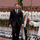 Crown Prince Haakon inspects an honour guard during welcoming ceremony in Putrajaya  (Photo: Reuters / Bazuki Muhammad)